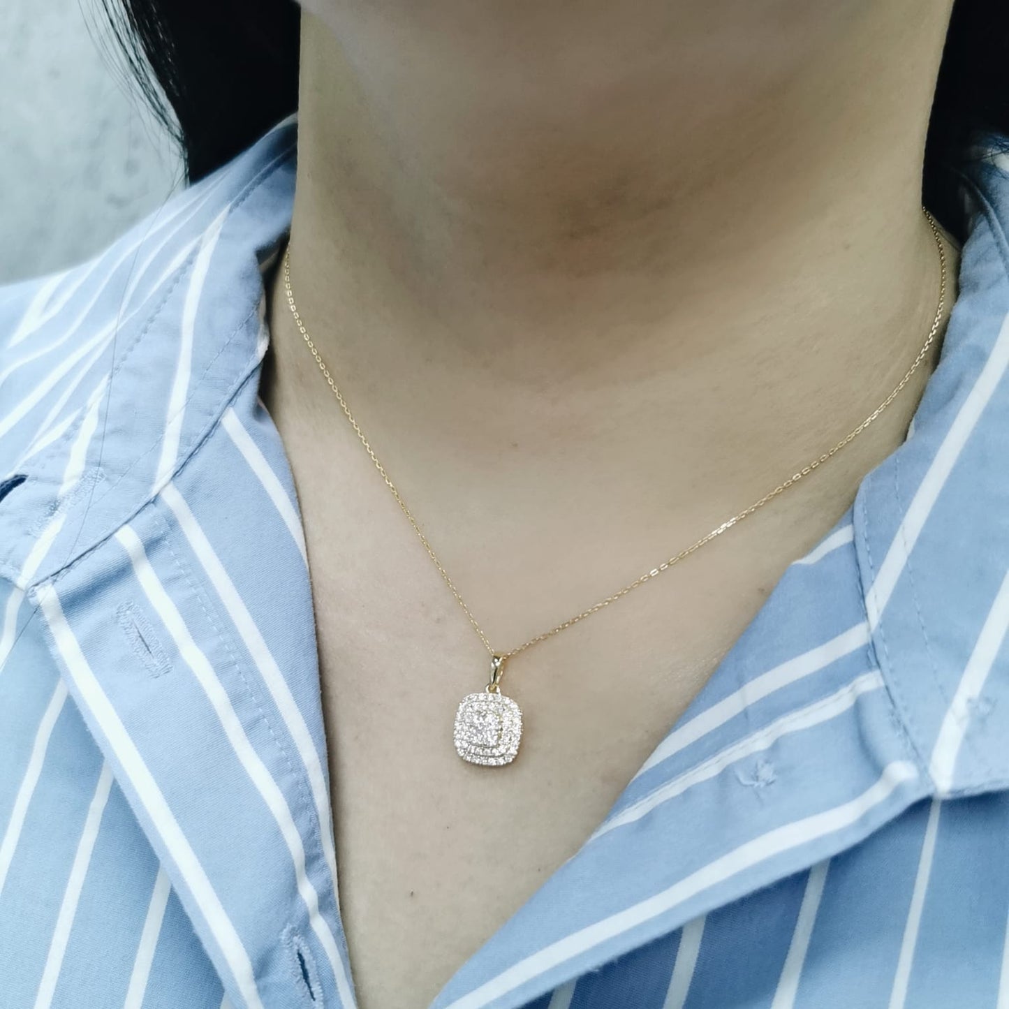 18K gold cushion-shaped diamond pendant with double halo design, 0.53 carats total, chain not included.