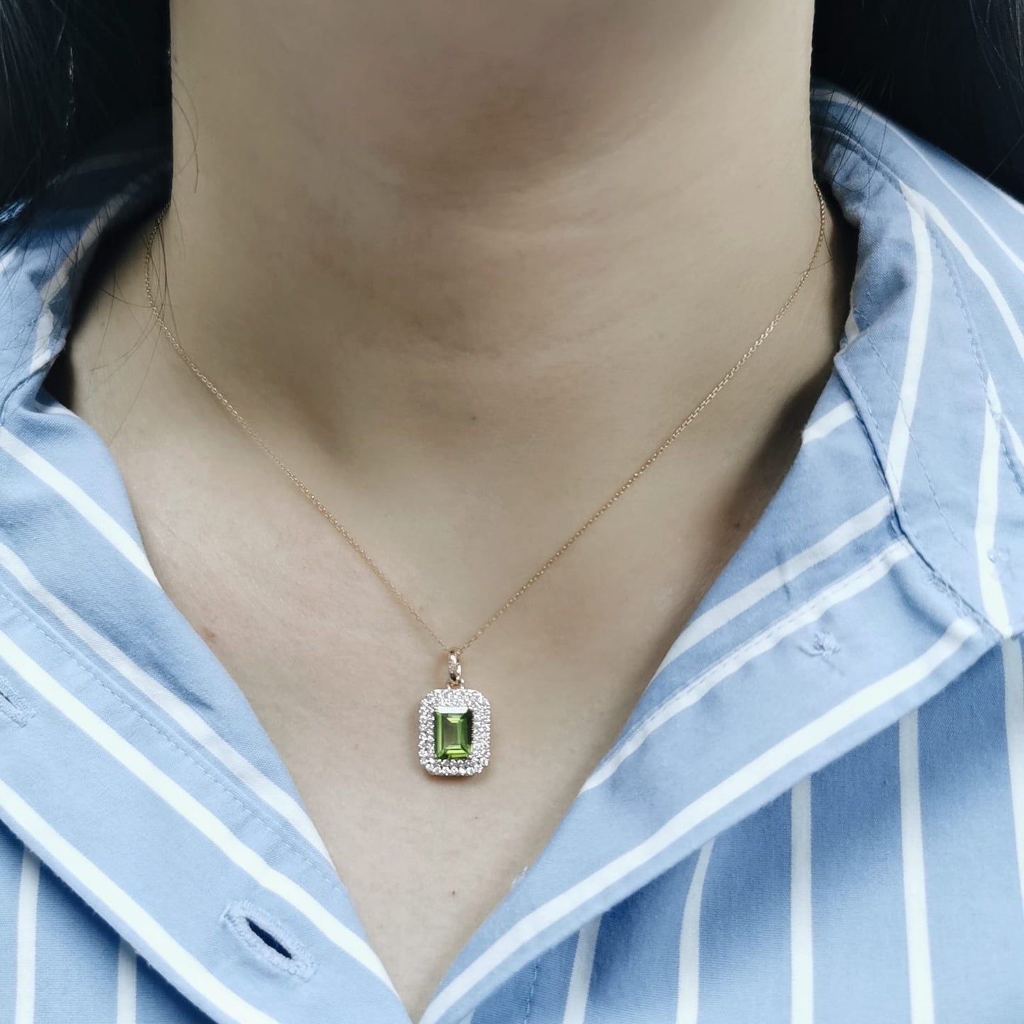 18K rose gold pendant with emerald-cut Peridot and diamond halo, 1.52ct Peridot and 0.40ct diamonds, chain not included.