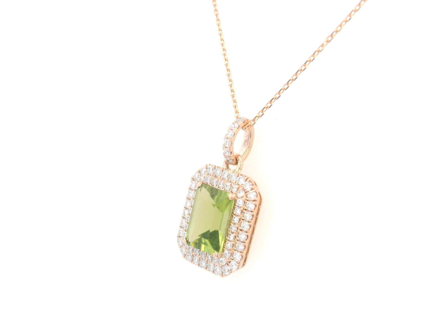 18K rose gold pendant with emerald-cut Peridot and diamond halo, 1.52ct Peridot and 0.40ct diamonds, chain not included.