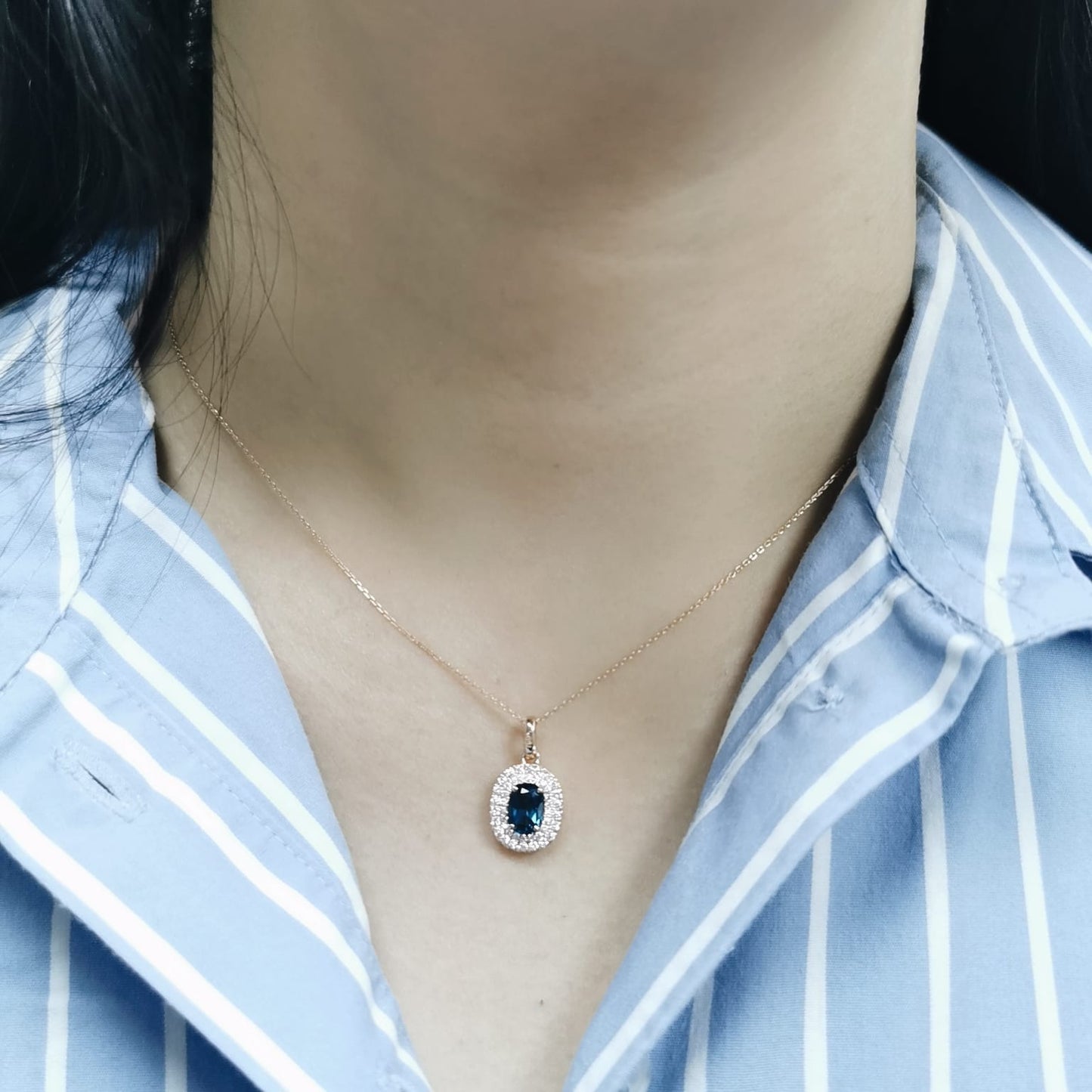 18K rose gold pendant with oval London Blue Topaz and diamond halo, 1.07ct Topaz and 0.35ct diamonds, chain not included.