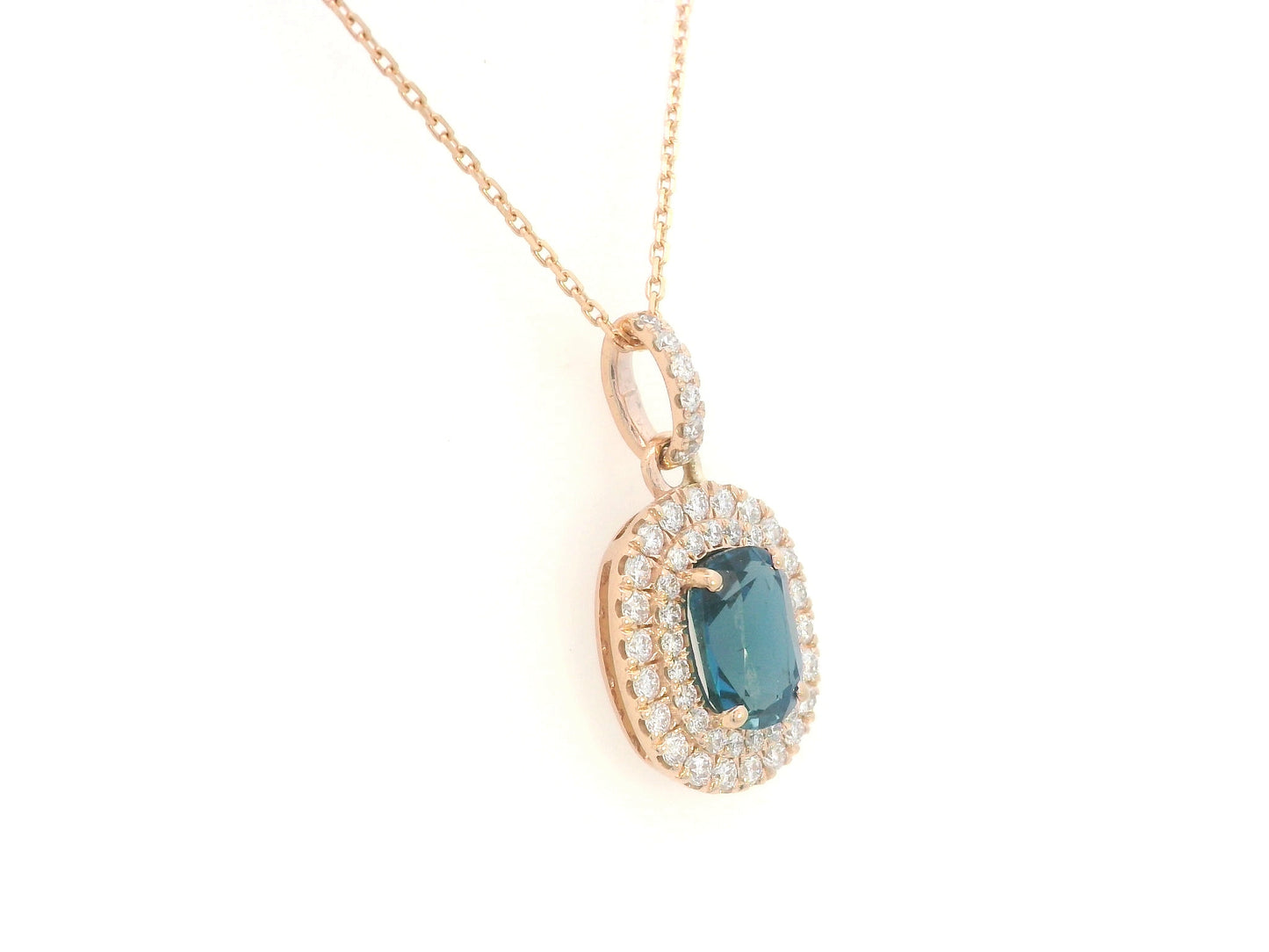 18K rose gold pendant with oval London Blue Topaz and diamond halo, 1.07ct Topaz and 0.35ct diamonds, chain not included.
