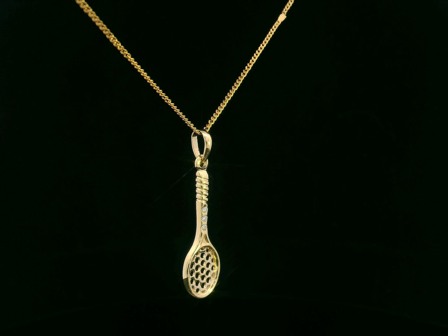 18K yellow gold tennis racket pendant with diamond handle detailing