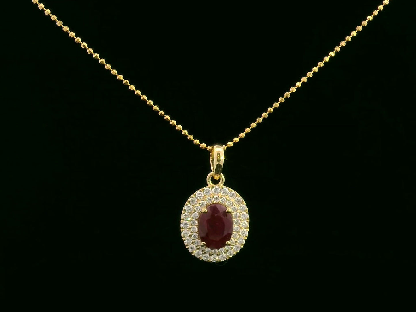 18K Gold Pendant with 1.31 Carat Oval Ruby and Double Diamond Halo