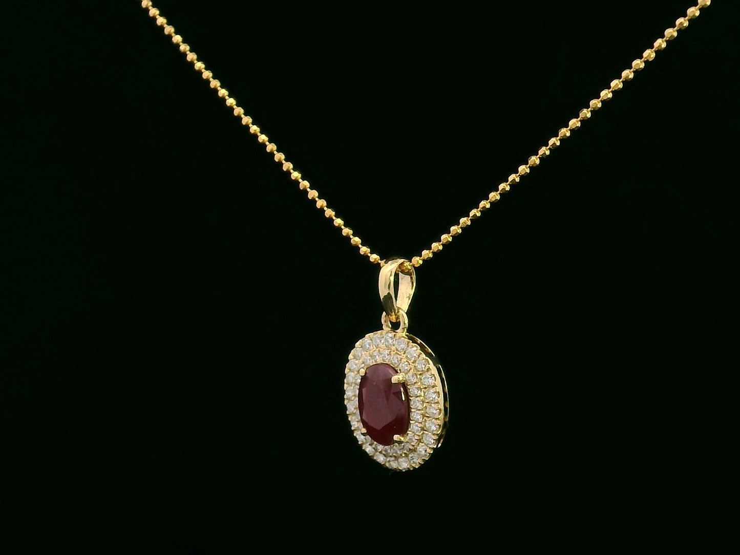 18K Gold Pendant with 1.31 Carat Oval Ruby and Double Diamond Halo