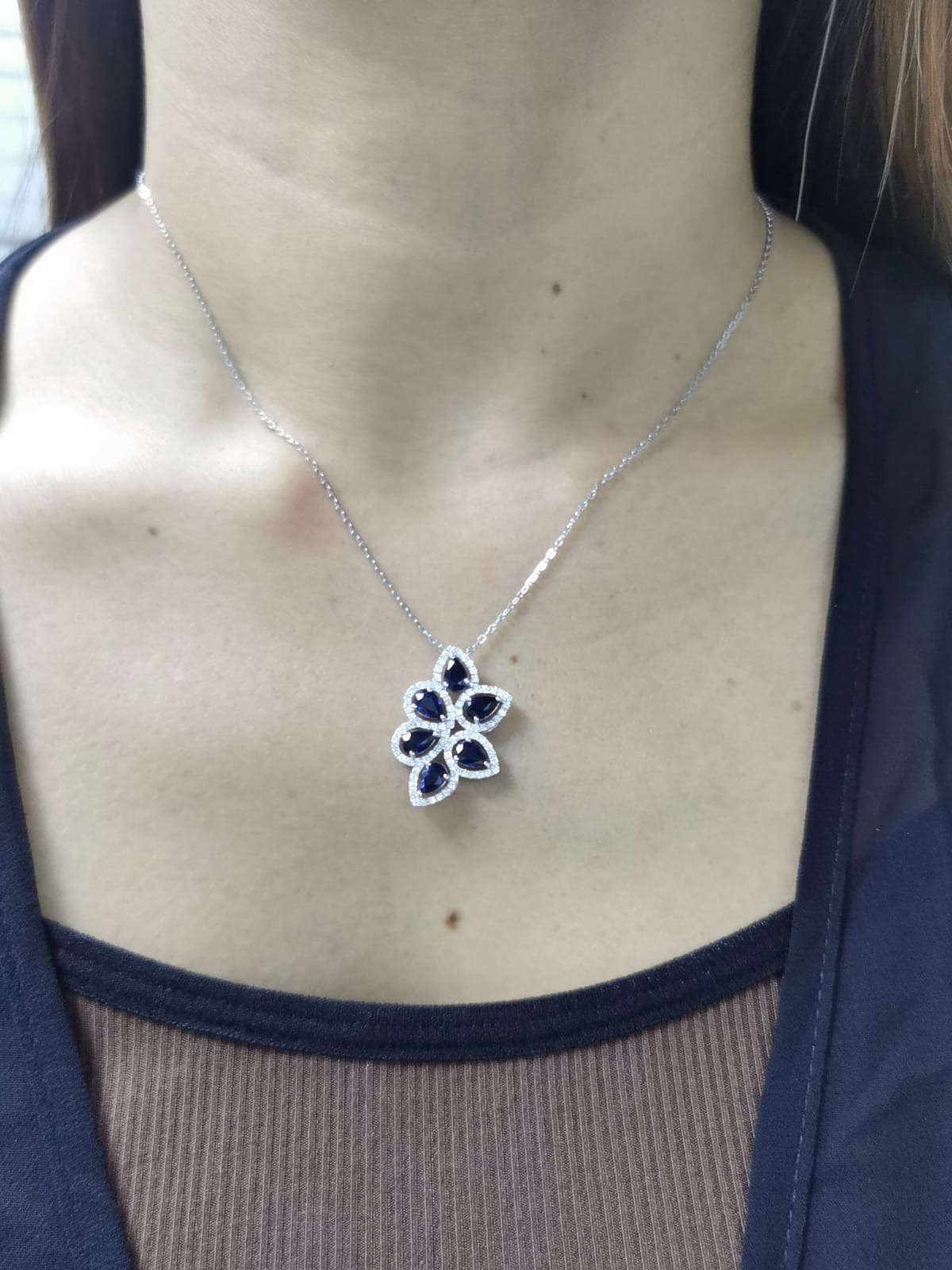 18K White Gold Blue Sapphire & Diamond Flower Pendant.