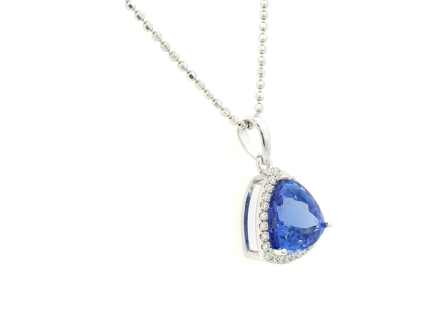 Trillion-cut Tanzanite pendant in 18K white gold with diamond halo, 3.43 carat Tanzanite and 0.16 carat diamonds