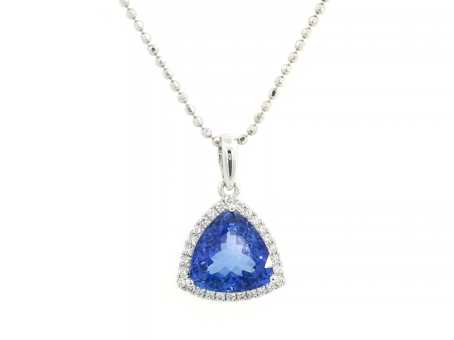Trillion-cut Tanzanite pendant in 18K white gold with diamond halo, 3.43 carat Tanzanite and 0.16 carat diamonds