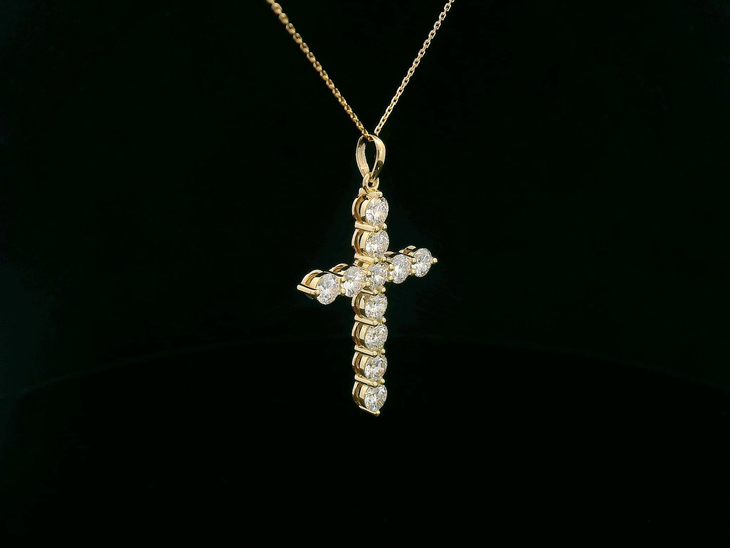 18K yellow gold cross pendant set with 11 round-cut diamonds totaling 2.21 carats (chain not included)