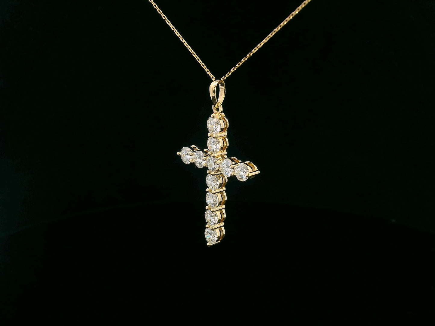 18K yellow gold cross pendant set with 11 round-cut diamonds totaling 2.21 carats (chain not included)