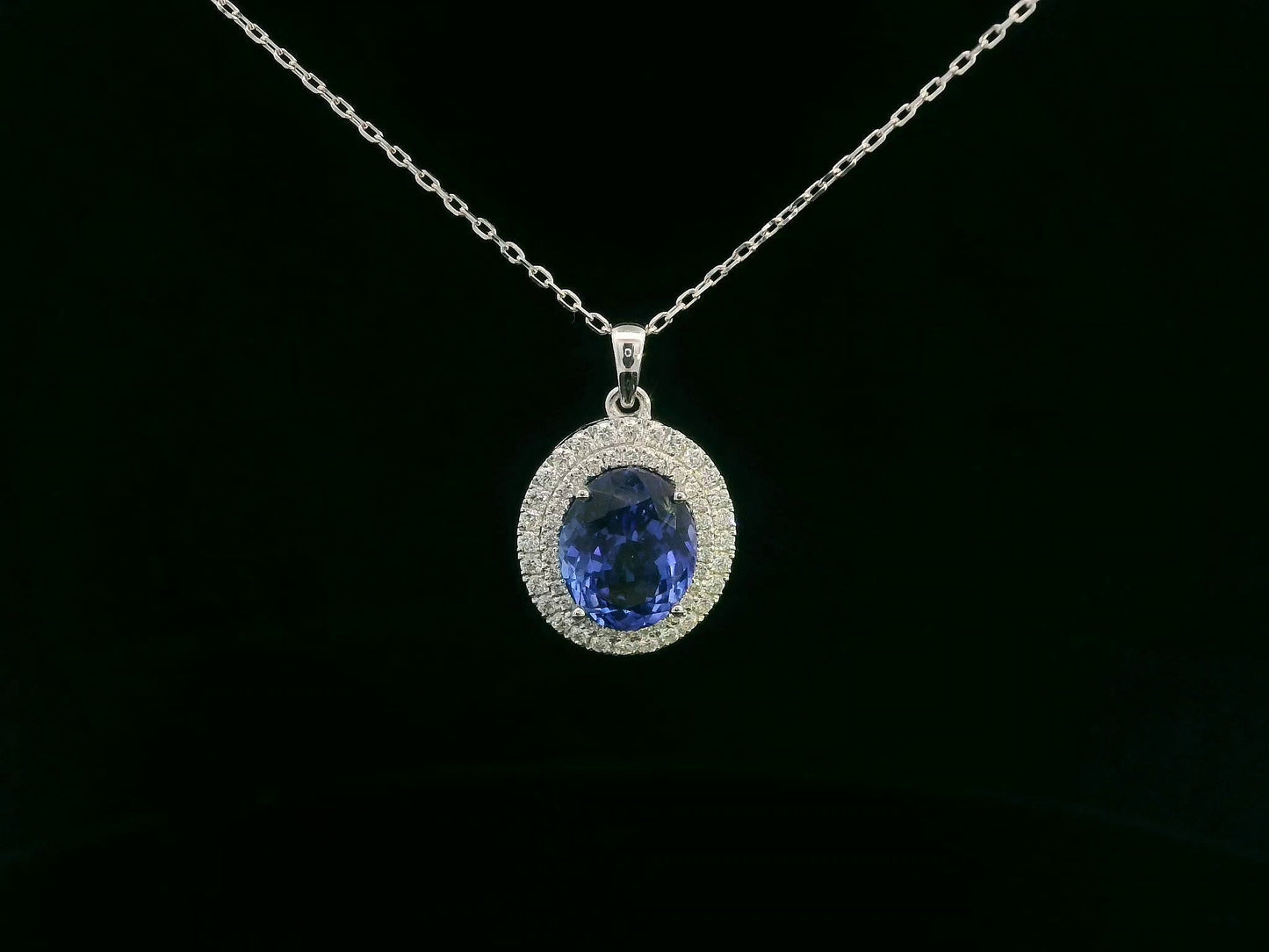 18K white gold double halo Tanzanite pendant