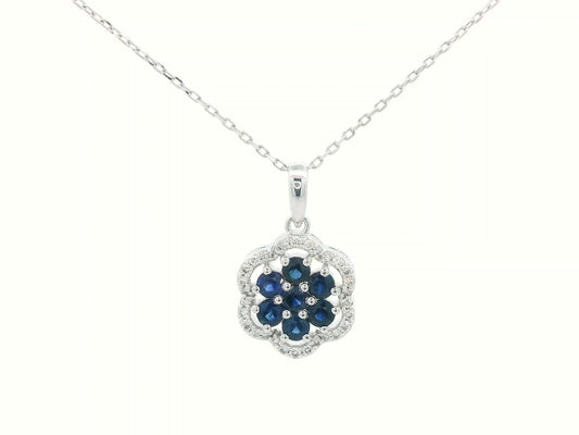 18K white gold floral pendant with sapphires and diamond halo