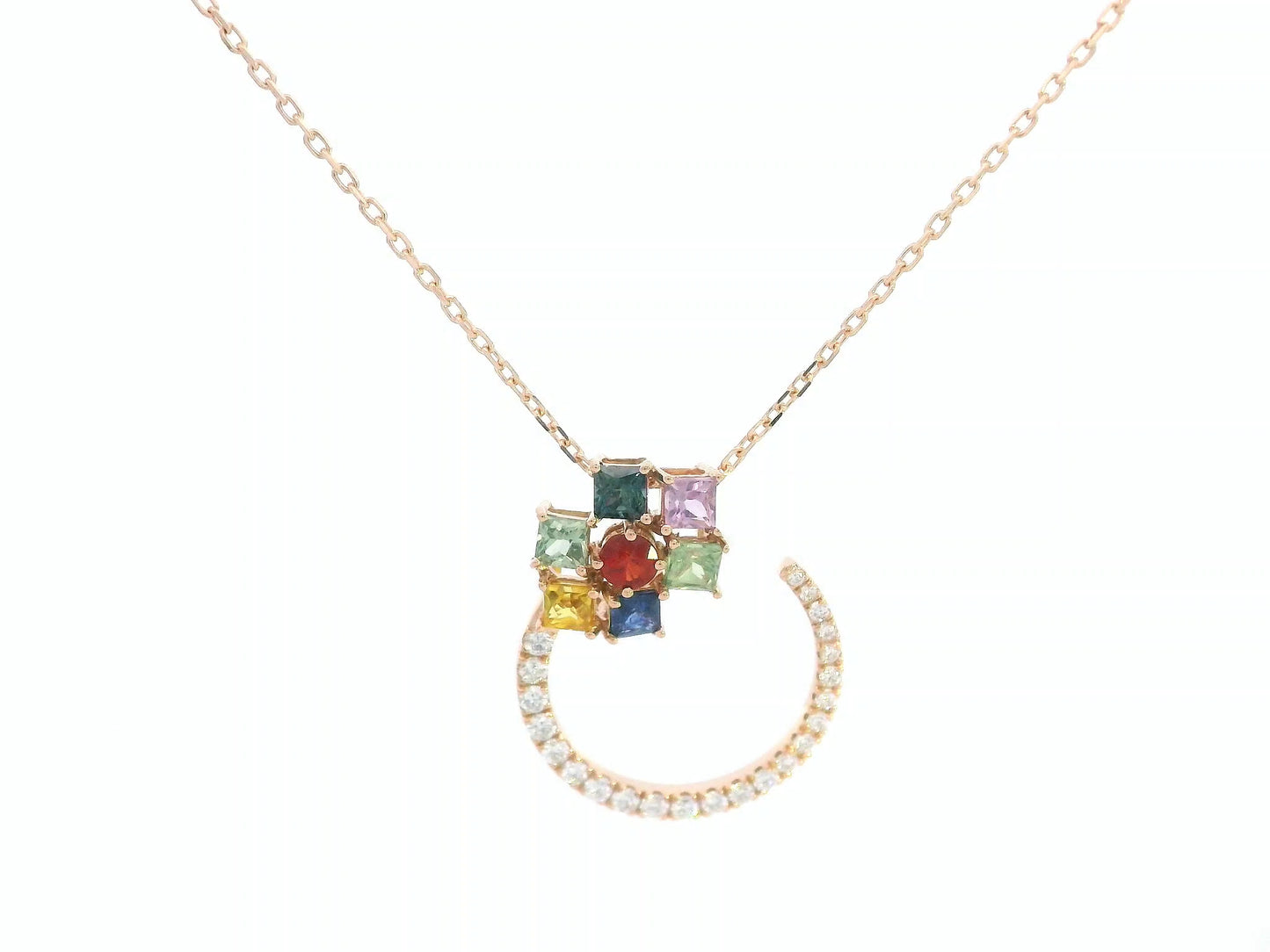 Necklace with colorful gemstone pendant on a white background
