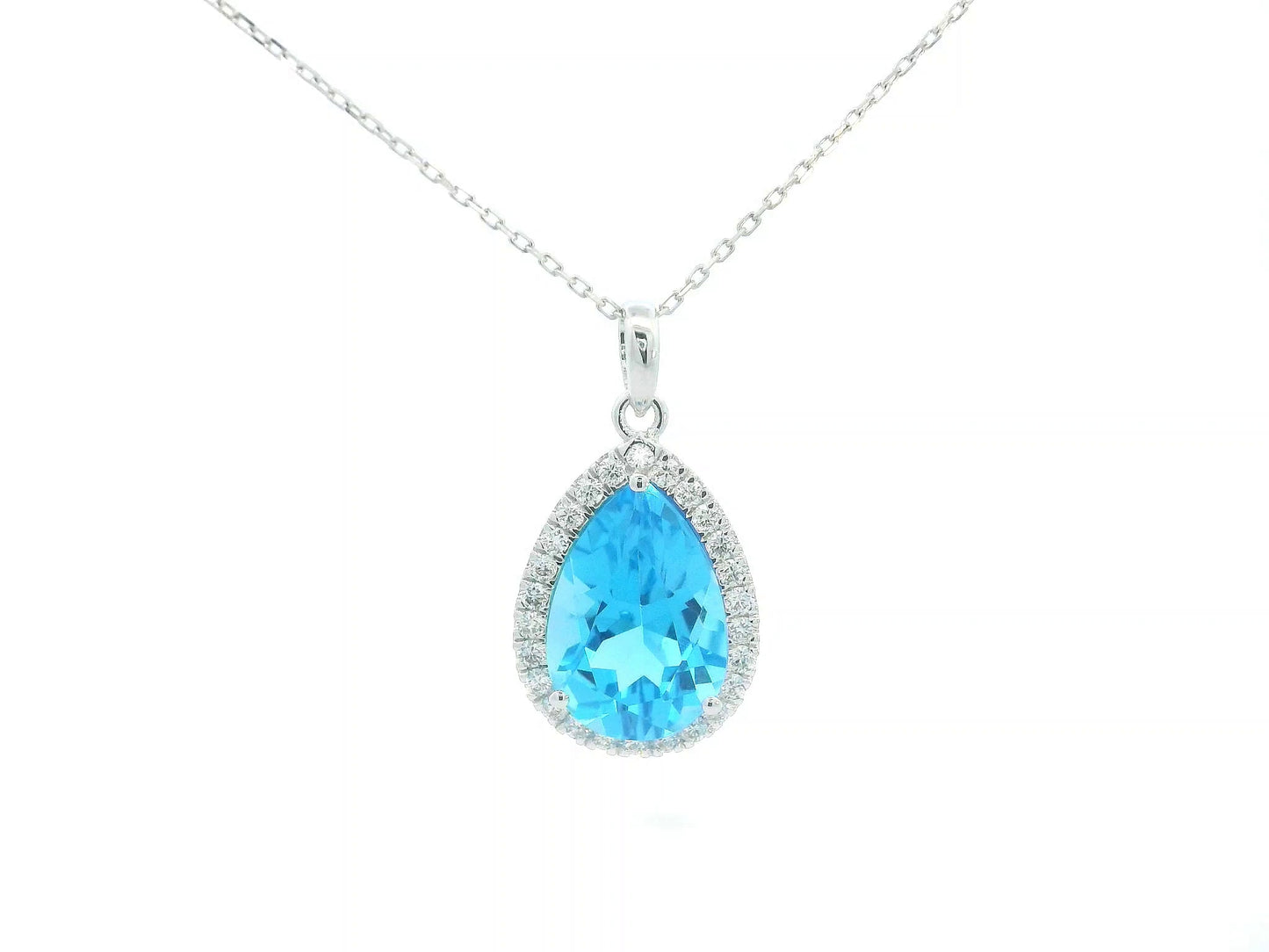 Pear-shaped Swiss Blue Topaz pendant in 18K white gold with diamond halo