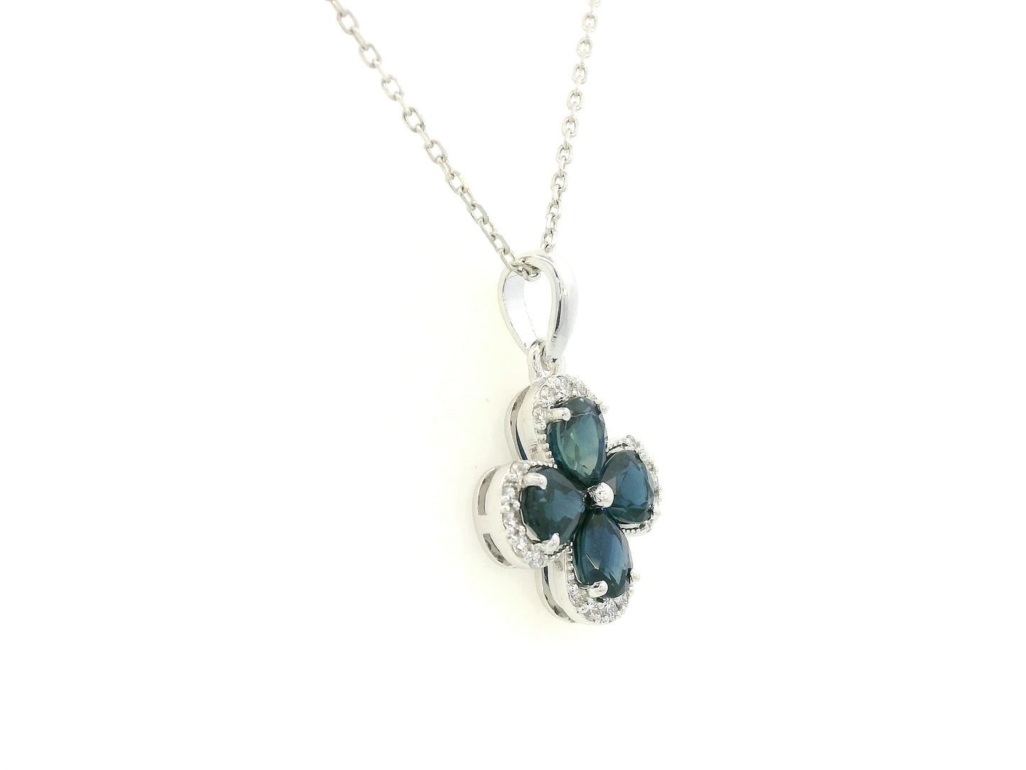 Blue sapphire and diamond flower pendant for women