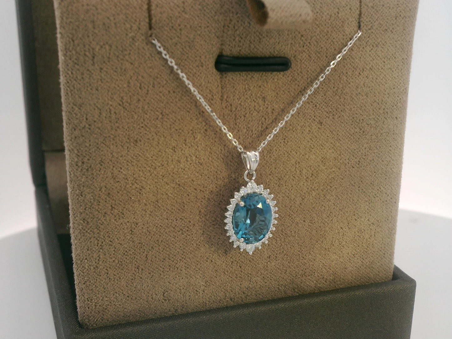 18k white gold oval London Blue Topaz halo pendant with diamonds – chain not included”