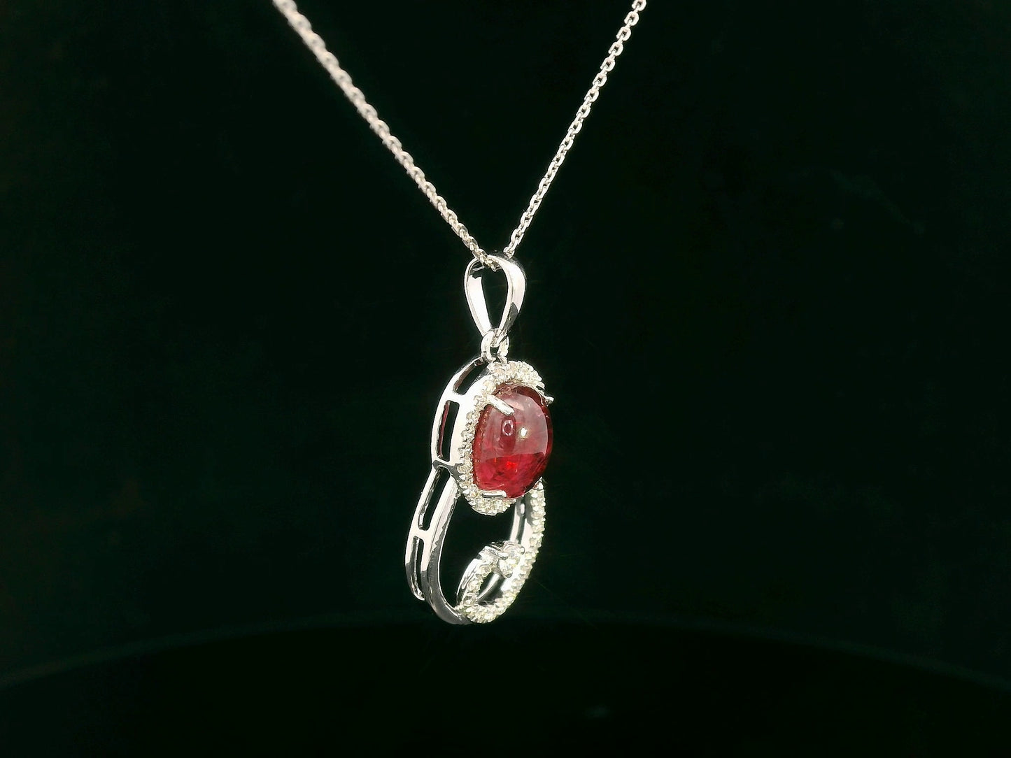 18k white gold swirl pendant with 1.99ct cabochon ruby & 0.21ct diamonds – certificate included
