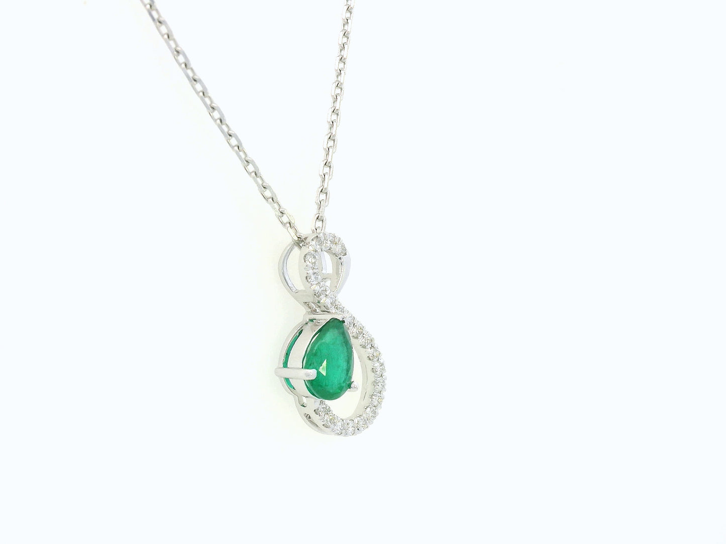 18k white gold pendant with 0.74ct pear-shaped emerald & 0.19ct diamond accents – certified authenticity included