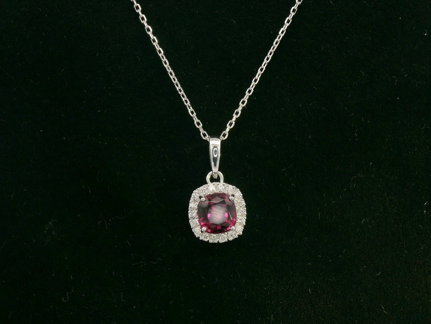 18k white gold pendant with 1.08ct cushion-cut rhodolite & 0.10ct diamond halo – certified authenticity included