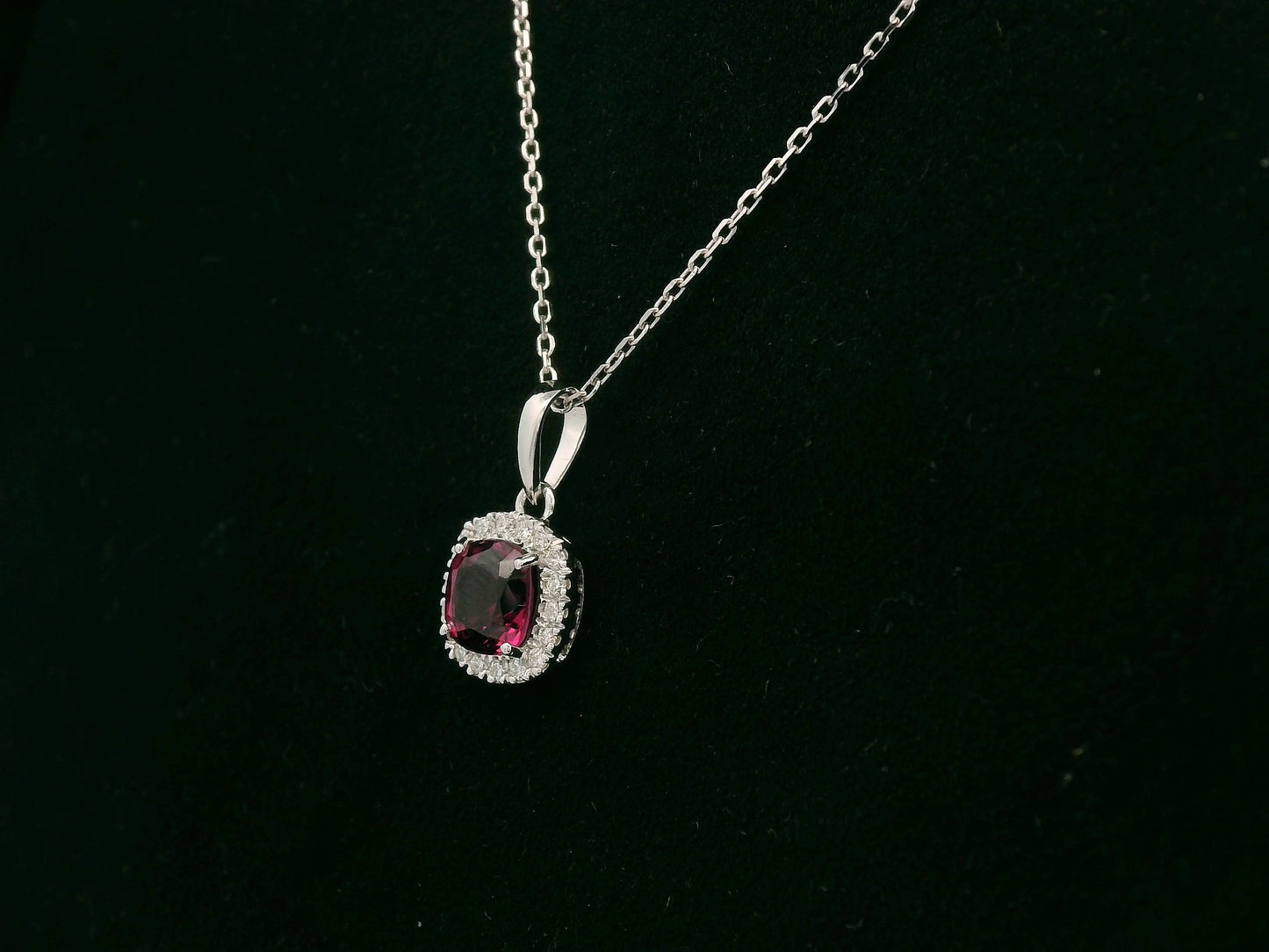 18k white gold pendant with 1.08ct cushion-cut rhodolite & 0.10ct diamond halo – certified authenticity included