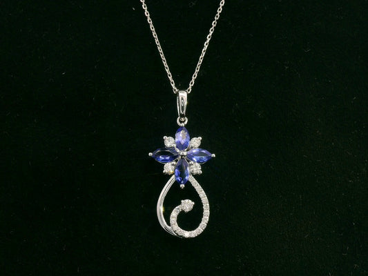 18K white gold Tanzanite and diamond floral paisley pendant featuring marquise-cut Tanzanites and pavé-set diamonds