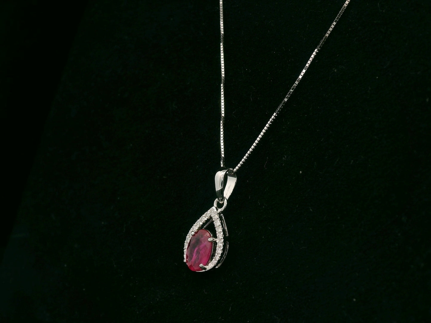 18K white gold ruby and diamond teardrop pendant with pear-shaped frame, Emirates Diamonds