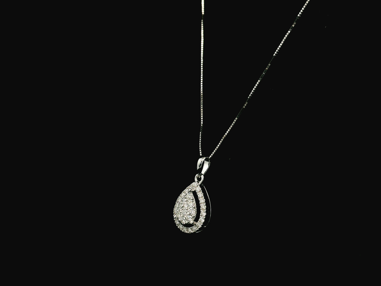 18K white gold pear shape diamond halo pendant with cluster center