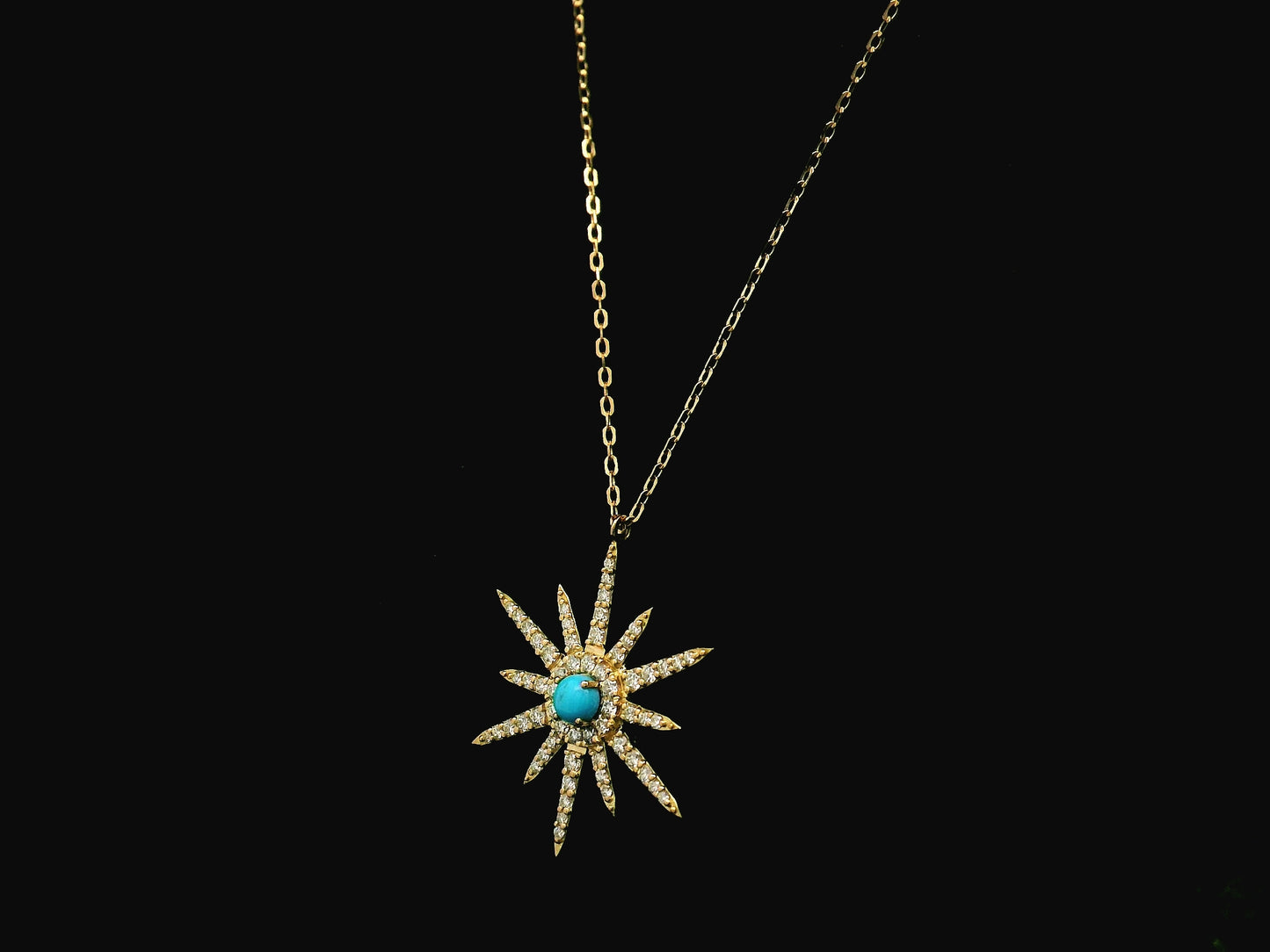Turquoise and diamond starburst pendant in 18K yellow gold by Emirates Diamonds