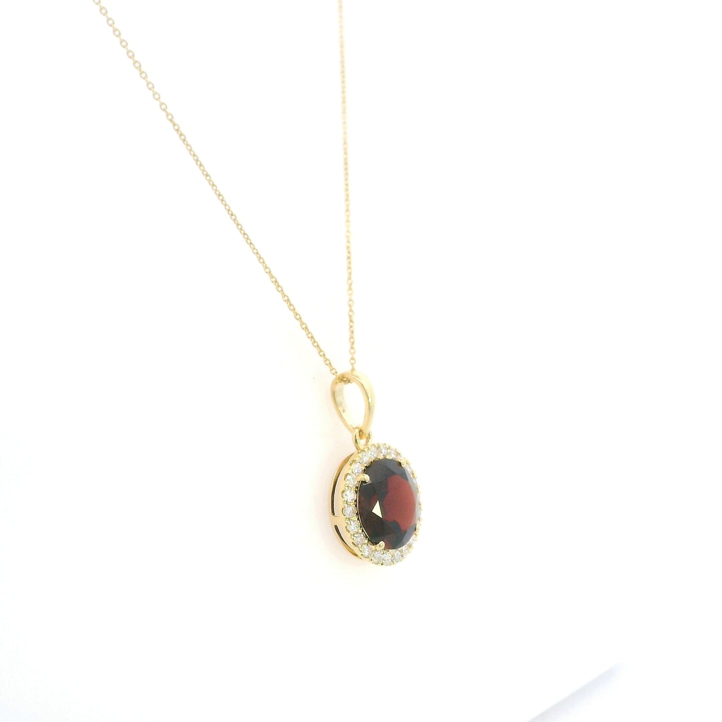 Round garnet diamond halo pendant in 18K yellow gold with 3.82 carat natural garnet