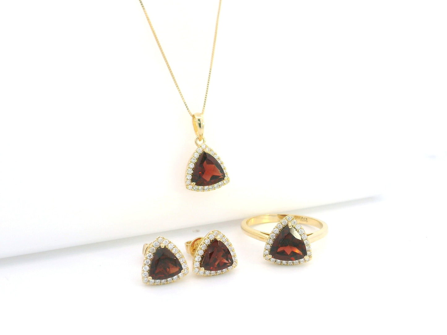 Garnet & Diamond Halo Ring in 18K Yellow Gold