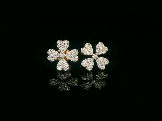 Diamond floral stud earrings with heart-shaped petals in 18K gold, 0.46 carat total weight