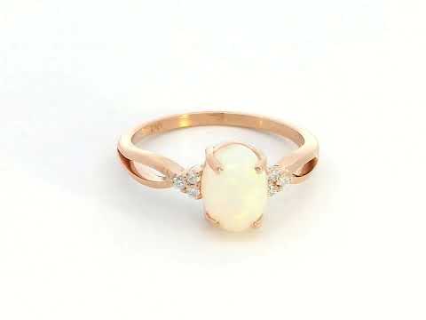 Elegant 18K gold Opal and diamond ring, 1.11-carat Opal with 0.06-carat diamond accents, October birthstone jewelry.