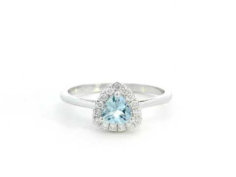 Trillion-cut aquamarine and diamond halo ring in 18K white gold, featuring a 0.50-carat aquamarine center stone surrounded by 0.15-carat diamonds.