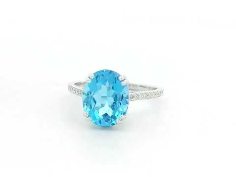 18K white gold ring with 4.58 carat oval Swiss Blue Topaz and diamond-accented band