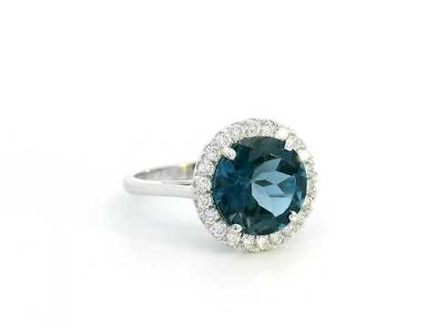 Elegant London Blue Topaz & Diamond Halo Ring in 18K White Gold – 4.33 Carat