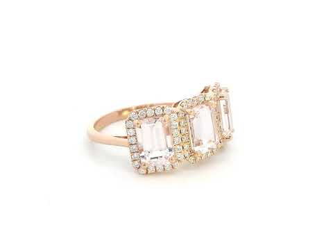 18K rose gold three-stone morganite and diamond ring featuring 2.79 carats of emerald-cut morganite with 0.38 carats of brilliant diamonds in a halo setting. A perfect statement or anniversary ring