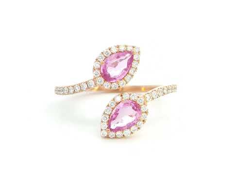 Toi et Moi ring in 18K rose gold with 1.44ct pear-shaped pink sapphires and 0.34ct diamond halo on a pavé band.