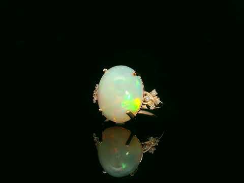 18K rose gold ring with 5.44ct oval opal cabochon and artistic diamond-accented side design