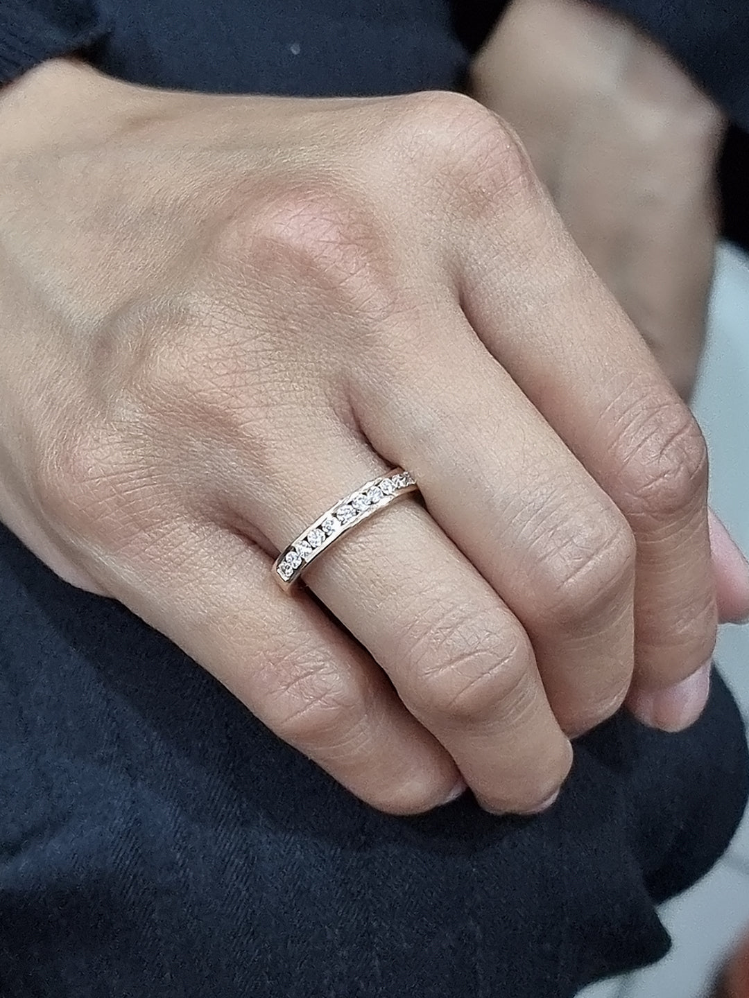 Elegant 18K yellow gold eternity band featuring 0.63ct channel-set round diamonds, perfect as a wedding, stacking, or anniversary ring.