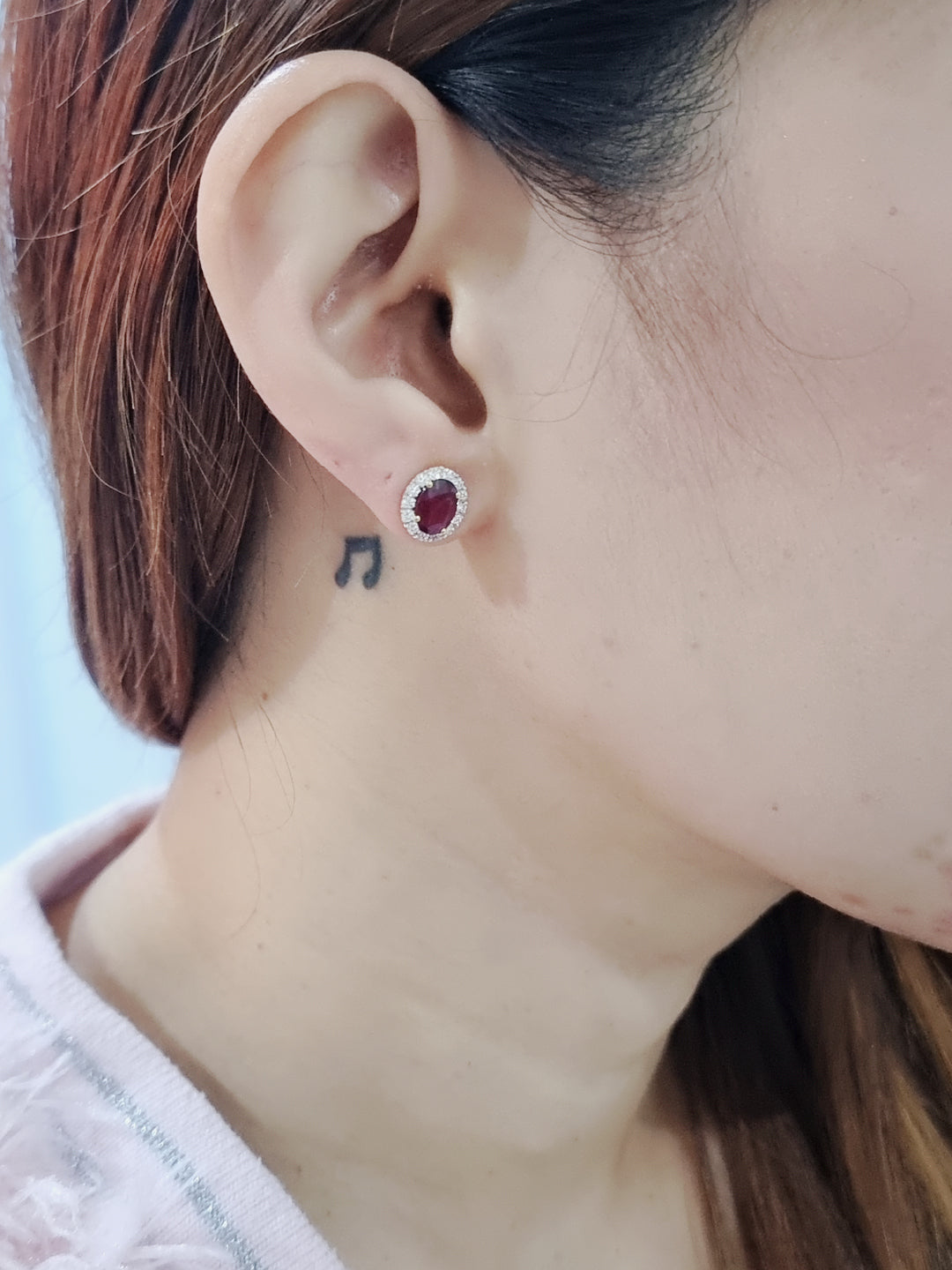 Oval Ruby With Diamond Halo Earrings In 18k Yellow Gold.