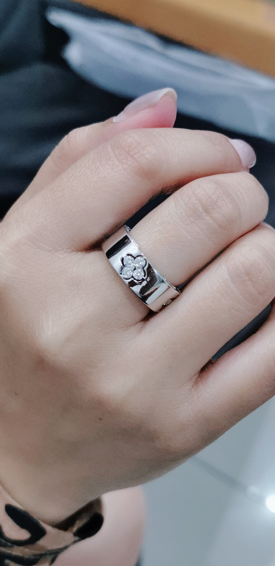 Flat, Pipe Cut Band Diamond Ring With A Floral Cluster In 18k White Gold.