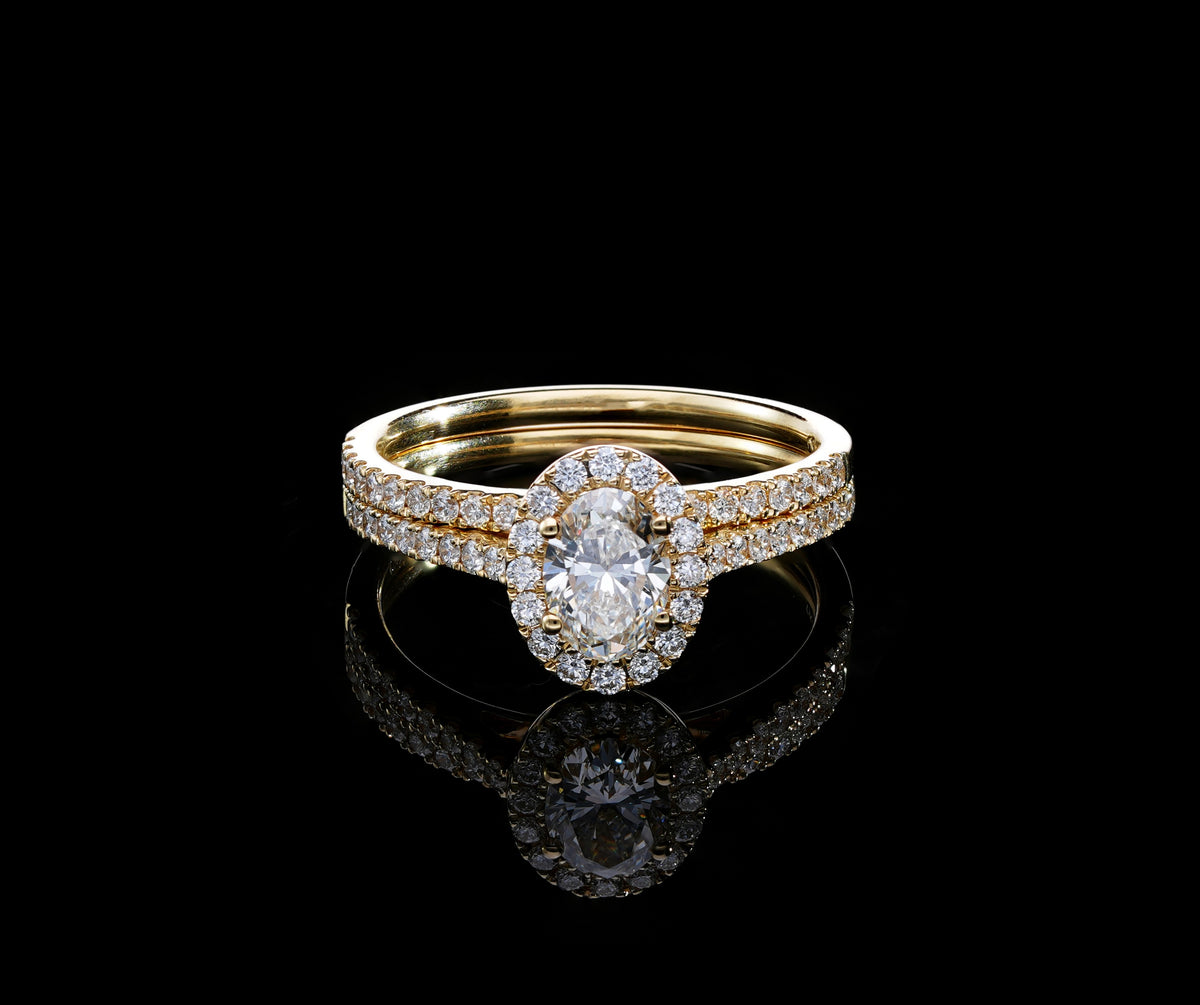 Oval Diamond Halo Bridal Set in 18K Yellow Gold | GIA Certified