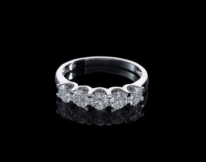 Five stone diamond band ring in 18K white gold with round brilliant diamonds set across the front