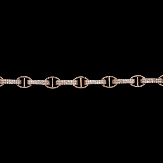 18K rose gold bracelet with alternating oval and elongated links, featuring pavé-set round diamonds and a lobster clasp.