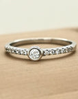 Bezel Set Diamond Ring In 18k White Gold.