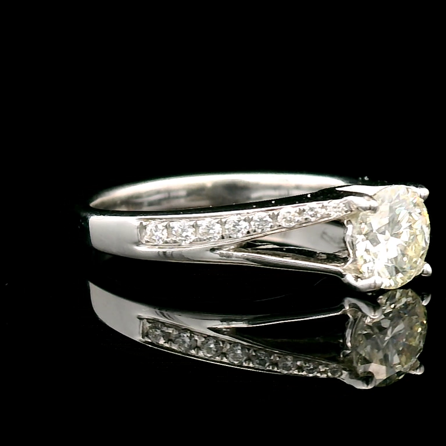 Split Shank Solitaire Diamond 0.70 Carat Ring In 18k Gold.