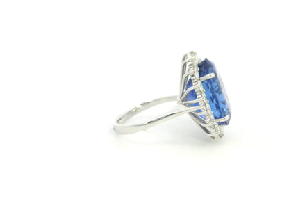 18K white gold oval tanzanite statement ring with diamond halo and 16.11 carat tanzanite by Emirates Diamonds