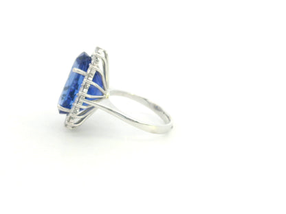 18K white gold oval tanzanite statement ring with diamond halo and 16.11 carat tanzanite by Emirates Diamonds
