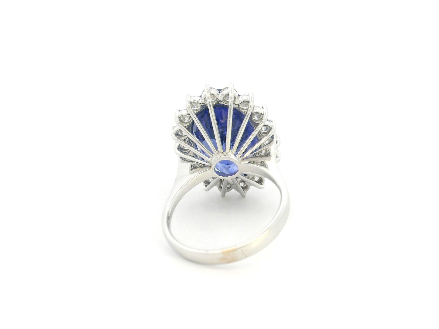 18K white gold oval tanzanite statement ring with diamond halo and 16.11 carat tanzanite by Emirates Diamonds
