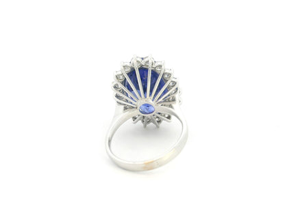18K white gold oval tanzanite statement ring with diamond halo and 16.11 carat tanzanite by Emirates Diamonds