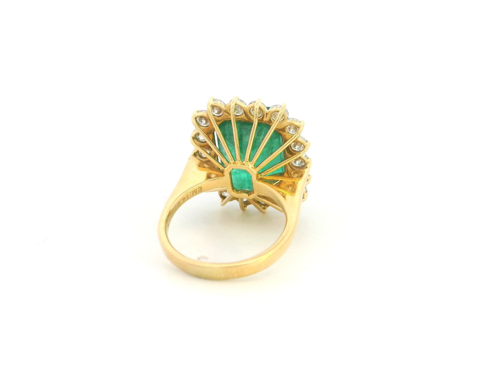 14.87 carat emerald and diamond halo statement ring in 18K yellow gold by Emirates Diamonds